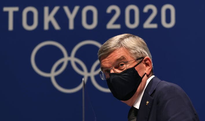 (210721) -- TOKYO, July 21, 2021 -- International Olympic Committee (IOC) President Thomas Bach attends a press conference, PK, Pressekonferenz at the Main Press Center (MPC) of Tokyo 2020 in Tokyo, Japan, July 21, 2021. ) (TOKYO2020)JAPAN-TOKYO-OLYMPICS-MPC-PRESS CONFERENCE JiaxHaocheng 