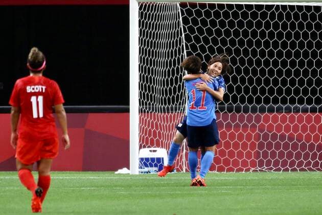 Japan v Canada: Women s Football - Olympics: Day -2 (10)Mana Iwabuchi of Team Japan celebrates with teammate (11) Mina Tanaka after scoring their side s first goal during the Women s First Round Group E match between Japan and Canada during the Tokyo 2020 Olympic Games, Olympische Spiele, Olympia, OS at Sapporo Dome stadium on July 21, 2021 in Sapporo, Hokkaido, Japan. Sapporo Japan aref-notitle210721_npjWO  Copyright: xAymanxArefx