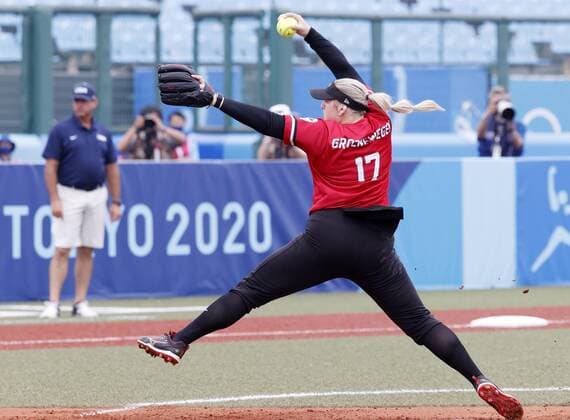 Tokyo Olympics: Softball Sara Groenewegen of Canada pitches against the United States in the opening round of the Tokyo Olympic softball tournament at Fukushima Azuma stadium in Fukushima, northeastern Japan, on July 22, 2021.  A14AA0000753436P