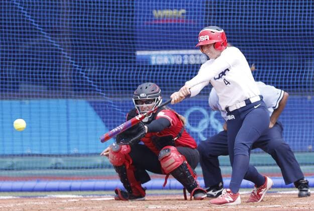 Tokyo Olympics: Softball Amanda Chidester of the United States hits an RBI single in the fifth inning against Canada in the opening round of the Tokyo Olympic softball tournament at Fukushima Azuma stadium in Fukushima, northeastern Japan, on July 22, 2021.  A14AA0000753437P