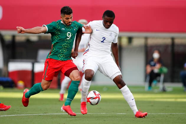 July 22, 2021, Tokyo, Japan: HENRY MARTI (9) of Mexico in action against PIERRE KALULU (2) of France during a men s soccer game between Mexico and France at the Tokyo Stadium for the Tokyo 2020, Olympic Games, Olympische Spiele, Olympia, OS Mexico won the match 4-1. Tokyo Japan - ZUMAm191 20210722_zap_m191_001 Copyright: xRodrigoxReyesxMarinx