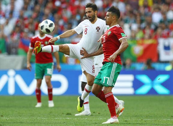 Mandatory Credit: Photo by Kieran Mcmanus BPI Shutterstock (9722514cx) Joao Moutinho of Portugal and Nabil Dirar of Morocco Portugal v Morocco, Group B, 2018 FIFA World Cup, WM, Weltmeisterschaft, Fussball football match, Luzhniki Stadium, Moscow, Russia - 20 Jun 2018 Portugal v Morocco, Group B, 2018 FIFA World Cup football match, Luzhniki Stadium, Moscow, Russia - 20 Jun 2018  Copyright: xKieranxMcmanus BPI Shutterstockx 9722514cx