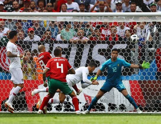 Mandatory Credit: Photo by Kieran Mcmanus BPI Shutterstock (9722514o) Cristiano Ronaldo of Portugal scores the opening goal Portugal v Morocco, Group B, 2018 FIFA World Cup, WM, Weltmeisterschaft, Fussball football match, Luzhniki Stadium, Moscow, Russia - 20 Jun 2018 Portugal v Morocco, Group B, 2018 FIFA World Cup football match, Luzhniki Stadium, Moscow, Russia - 20 Jun 2018  Copyright: xKieranxMcmanus BPI Shutterstockx 9722514o