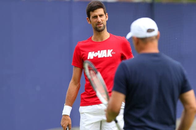 Mandatory Credit: Photo by Ella Ling Shutterstock (9718058az) Novak Djokovic of Serbia speaks to his coach Fever-Tree Championships, Saturday Practice, Queens Club, London, UK - 16 June 2018 Fever-Tree Championships, Saturday Practice, Queens Club, London, UK - 16 June 2018  Copyright: xEllaxLing Shutterstockx 9718058az