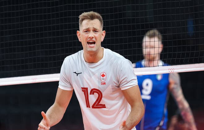 (210724) -- DONGJING, July 24, 2021 -- Lucas van Berkel of Canada reacts during the men s volleyball preliminary round match between Italy and Canada at Tokyo 2020 Olympic Games, Olympische Spiele, Olympia, OS in Tokyo, July 24, 2021. ) (TOKYO2020)JAPAN-TOKYO-OLY-MEN-VOLLEYBALL DingxTing 
