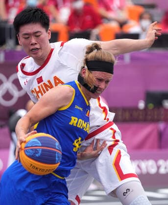 (210724) -- TOKYO, July 24, 2021 -- Gabriela Marginean (front) of Romania competes during the Tokyo 2020 women s pool round match of 3x3 basketball between China and Romania in Tokyo, Japan, July 24, 2021. ) (TOKYO2020)JAPAN-TOKYO-OLY-3x3 BASKETBALL-WOMEN S POOL ROUND ZhangxXiaoyu 