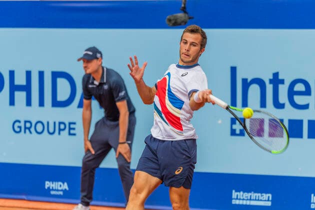 Switzerland: Semi-final of the Gstaad Swiss Open ATP, Tennis Herren Tour 250 Series tournament Gstaad Switzerland, 07 24 2021: Hugo Gaston of France is in action during the Gstaad Swiss Open ATP Tour 250 Series 2021 tournament final Gstaad Roy Emerson Arena Switzerland Canton of Bern Copyright: EricxDubost