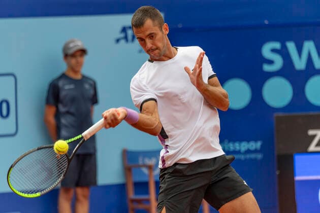 Switzerland: Semi-final of the Gstaad Swiss Open ATP, Tennis Herren Tour 250 Series tournament Gstaad Switzerland, 07 24 2021: Laslo Djere of Serbia is in action during the Gstaad Swiss Open ATP Tour 250 Series 2021 tournament final Gstaad Roy Emerson Arena Switzerland Canton of Bern Copyright: EricxDubost