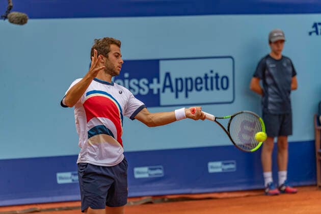 Switzerland: Semi-final of the Gstaad Swiss Open ATP, Tennis Herren Tour 250 Series tournament Gstaad Switzerland, 07 24 2021: Hugo Gaston of France is in action during the Gstaad Swiss Open ATP Tour 250 Series 2021 tournament final Gstaad Roy Emerson Arena Switzerland Canton of Bern Copyright: EricxDubost