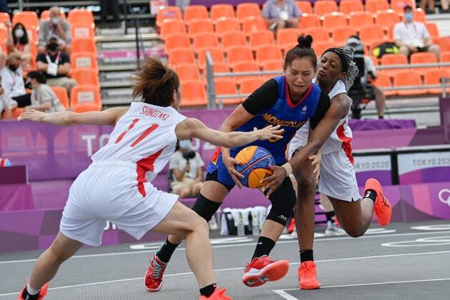 (210725) -- TOKYO, July 25, 2021 -- Khulan Onolbaatar (C) of Mongolia competes during the pool round of women s 3X3 basketball compeition between Japan and Mongolia at the Aomi Urban Sports Park in Tokyo, Japan, July 25, 2021. ) (TOKYO2020)JAPAN-TOKYO-OLY-3x3 BASKETBALL-WOMEN S POOL ROUND ZhangxXiaoyu 