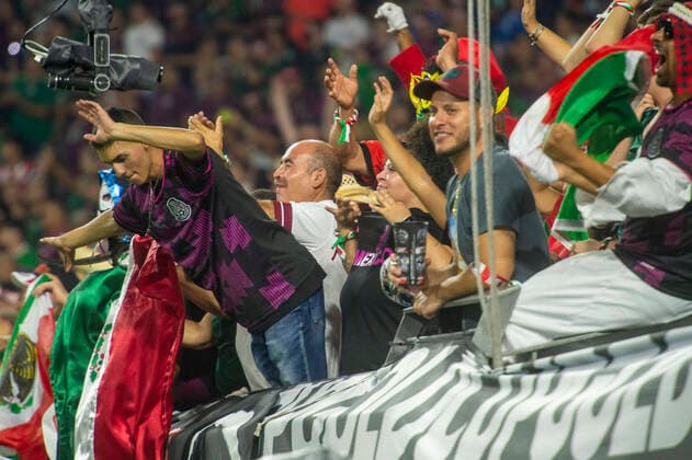 July 24, 2021, Glendale, Arizona, U.S: Fans celebrate after Mexico scores a goal against Honduras Saturday, July 24, 2021, at State Farm Stadium in Glendale, Arizona. Mexico won 3-0 against Honduras in the Gold Cup Quarter Final. Glendale U.S. - ZUMAb166 20210724_zap_b166_004 Copyright: xJeffxBrownx