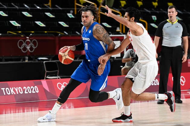 L-R Blake Schilb (Czech) and Mohammad Jamshidi (Iran) in action during match Iran vs Czech republic in men s basketball group phase, within the Tokyo 2020 Summer Olympics, on July 25, 2021, in Saitama, Japan. (CTKxPhoto OndrejxDeml) CTKPhotoP2021072502207 