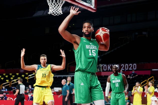 TOKYO, JAPAN - JULY 25: Jahlil Okafor of Team Nigeria and Dante Exum of Team Australia hold up their hands during the Men s Basketball preliminary Round Group B - Match 3 between Australia and Nigeria on Day 2 of the Tokyo 2020 Olympic Games, Olympische Spiele, Olympia, OS at Saitama Super Arena on July 25, 2021 in Tokyo, Japan. (Photo by Pete Dovgan Speed Media Icon Sportswire) OLYMPICS: JUL 25 Olympics Tokyo 2020 Icon2107250051
