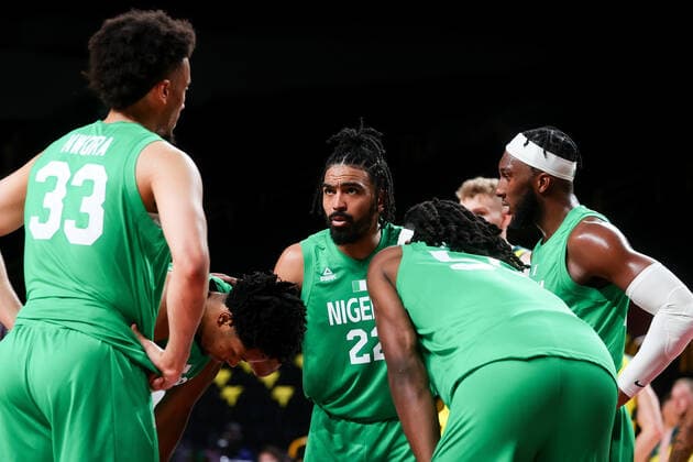 TOKYO, JAPAN - JULY 25: Team Nigeria in a huddle during the Men s Basketball preliminary Round Group B - Match 3 between Australia and Nigeria on Day 2 of the Tokyo 2020 Olympic Games, Olympische Spiele, Olympia, OS at Saitama Super Arena on July 25, 2021 in Tokyo, Japan. (Photo by Pete Dovgan Speed Media Icon Sportswire) OLYMPICS: JUL 25 Olympics Tokyo 2020 Icon2107250086