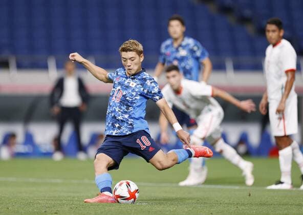 Tokyo Olympics: Football Ritsu Doan scores Japan s second goal from the penalty spot during the first half of their Group A men s football match against Mexico at the Tokyo Olympics on July 25, 2021, at Saitama Stadium in Saitama, eastern Japan.  A14AA0000754345P