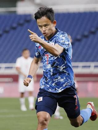 Tokyo Olympics: Football Japan s Takefusa Kubo reacts after opening the scoring against Mexico during the first half of their Group A men s football match of the Tokyo Olympics on July 25, 2021, at Saitama Stadium in Saitama, eastern Japan.  A14AA0000754348P