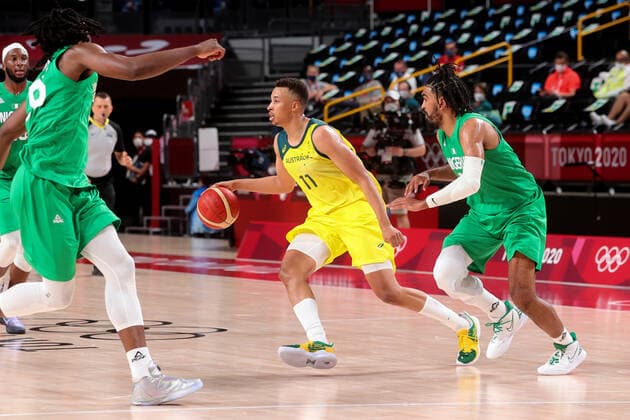 TOKYO, JAPAN - JULY 25: Dante Exum of Team Australia dribbles the ball during the Men s Basketball preliminary Round Group B - Match 3 between Australia and Nigeria on Day 2 of the Tokyo 2020 Olympic Games, Olympische Spiele, Olympia, OS at Saitama Super Arena on July 25, 2021 in Tokyo, Japan. (Photo by Pete Dovgan Speed Media Icon Sportswire) OLYMPICS: JUL 25 Olympics Tokyo 2020 Icon2107250162