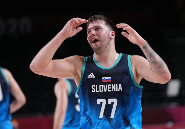 (210726) -- TOKYO, July 26, 2021 -- Luka Doncic of Slovenia reacts during the men s basketball preliminary round match between Argentina and Slovenia at the Tokyo Olympic Games, Olympische Spiele, Olympia, OS in Tokyo, Japan, on July 26, 2021. ) (TOKYO2020)JAPAN-TOKYO-OLY-BASKETBALL-MEN S PRELIMINARY MengxYongmin 