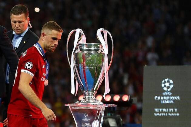 Mandatory Credit: Photo by Kieran Mcmanus BPI Shutterstock (9694071hv) Jordan Henderson walks past the Champion League trophy after collecting his runners up medal Real Madrid v Liverpool, UEFA Champions League Final, Olimpiyskiy National Sports Complex Stadium, Kiev, UA, 26 May 2018 Real Madrid v Liverpool, UEFA Champions League Final, Olimpiyskiy National Sports Complex Stadium, Kiev, UA, 26 May 2018 Copyright: xKieranxMcmanus BPI Shutterstockx 9694071hv