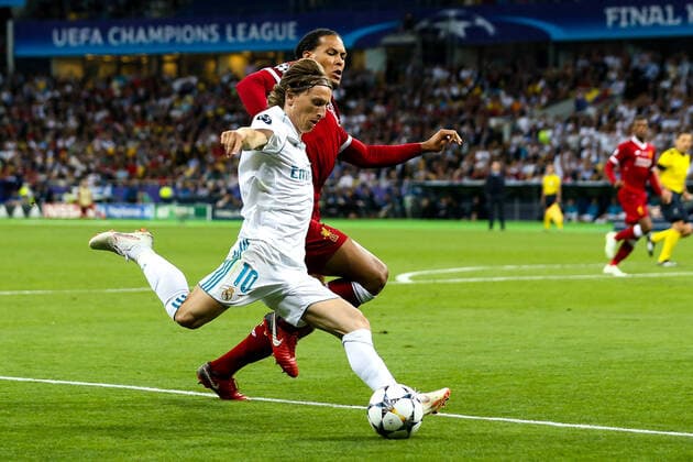 Mandatory Credit: Photo by Robbie Stephenson Jmp Shutterstock (9694113hc) Luka Modric of Real Madrid takes on Virgil van Dijk of Liverpool Real Madrid v Liverpool, Ukraine - 26 May 2018 EDITORIAL USE ONLY Real Madrid v Liverpool, Ukraine - 26 May 2018 EDITORIAL USE ONLY  Copyright: xRobbiexStephenson Jmp Shutterstockx 9694113hc