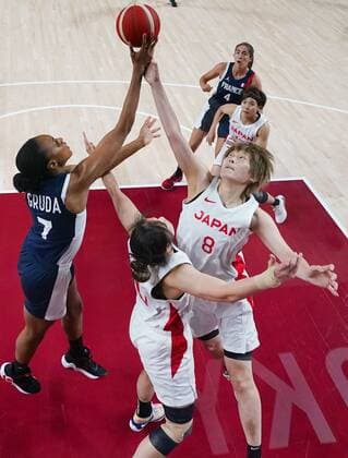 Tokyo Olympics: Basketball Japan s Maki Takada (8) and France s Sandrine Grida (7) reach for a rebound during the third quarter of their Tokyo Olympic women s basketball preliminary-round game on July 27, 2021, at Saitama Super Arena near Tokyo.  A14AA0000754620P