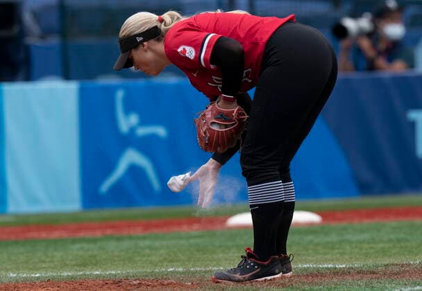 July 27, 2021, Yokohama, Japan: Canadian softball pitcher Danielle Lawrie, from Langley, B.C. uses a chalk bag to dry her hand during the bronze medal game against Mexico at the 2020 Tokyo Olympics, Tuesday, July 27, 2021 in Yokohama, Japan. Canada News - July 27, 2021  - ZUMAc35_ 20210727_zaf_c35_025 Copyright: xThexCanadianxPressx