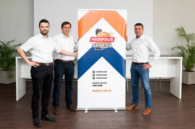 Press conference Basketball BARMER 2 Basketball Bundesliga ProA Science City Jena becomes MEDIPOLIS SC Jena v li Jenas head of finance Benjamin Koppe, Medipolis CEO Dr Christian Wegner and Baskets Jena CEO Lars Eberlein present the new logo Sparkassen Arena Jena