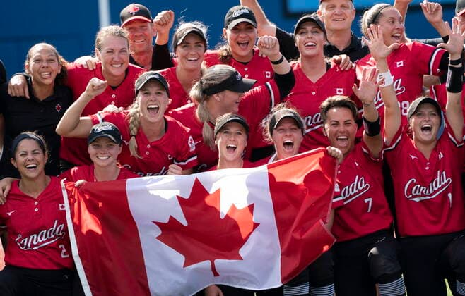 July 27, 2021, Yokohama, Japan: CanadaöÄÃ s WomenöÄÃ s softball team pose for a photo with the Canadian flag after their win over Mexico in the bronze medal game at the Tokyo Olympics, Tuesday, July 27, 2021 in Yokohama, Japan. Canada News - July 27, 2021  - ZUMAc35_ 20210727_zaf_c35_066 Copyright: xThexCanadianxPressx