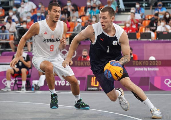 TOKYO, JAPAN - JULY 28, 2021: Serbia s Mihailo Vasic (L) and ROC Team s Stanislav Sharov are in action in their 3x3 men s basketball semifinal match at the 2020 Summer Olympic Games, Olympische Spiele, Olympia, OS at Aomi Urban Sports Park. Stanislav Krasilnikov TASS  TS109F26