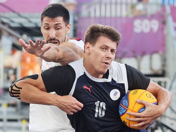 TOKYO, JAPAN - JULY 28, 2021: ROC Team s Kirill Pisklov (R) is in action in the men s 3x3 basketball semifinal match against Serbia at the 2020 Summer Olympic Games, Olympische Spiele, Olympia, OS at Aomi Urban Sports Park. Stanislav Krasilnikov TASS  TS109F4A