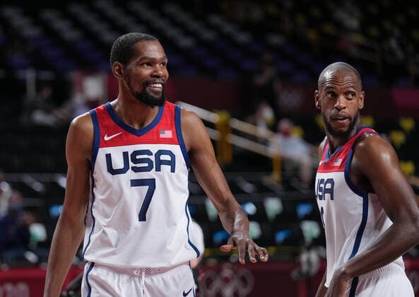(210728) -- TOKYO, July 28, 2021 -- Kevin Durant (L) of the United States reacts during the men s preliminary round match of basketball between the United States and Iran at Tokyo 2020 Olympic Games, Olympische Spiele, Olympia, OS in Saitama, Japan, July 28, 2021. ) (TOKYO2020)JAPAN-SAITAMA-OLY-BASKETBALL-MEN S PRELIMINARY MengxYongmin 