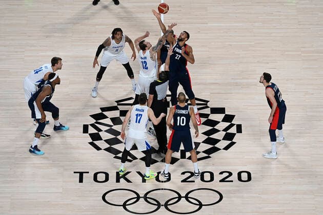 Centre Czech Ondrej Balvin (12) and Rudy Gobertin of France (27) in action during the basketball Group A match Czech Republic vs. France in Tokyo 2020 Summer Olympics, Japan, July 28, 2021. (CTKxPhoto OndrejxDeml) CTKPhotoP2021072811374  dml