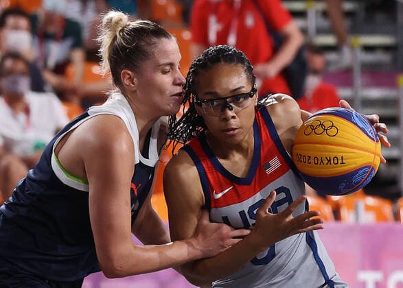 TOKYO, JAPAN - JULY 28, 2021: The USA s Allisha Gray (R) dribbles past ROC s Yevgenia Frolkina in their women s 3x3 basketball gold medal match during the Tokyo 2020 Summer Olympic Games, Olympische Spiele, Olympia, OS at the Aomi Urban Sports Park. Stanislav Krasilnikov TASS  TS10A08D
