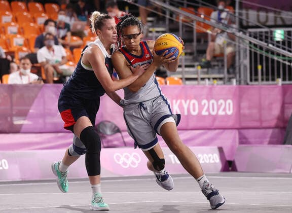 TOKYO, JAPAN - JULY 28, 2021: The USA s Allisha Gray (R) dribbles past ROC s Yevgenia Frolkina in their women s 3x3 basketball gold medal match during the Tokyo 2020 Summer Olympic Games, Olympische Spiele, Olympia, OS at the Aomi Urban Sports Park. Stanislav Krasilnikov TASS  TS10A08E