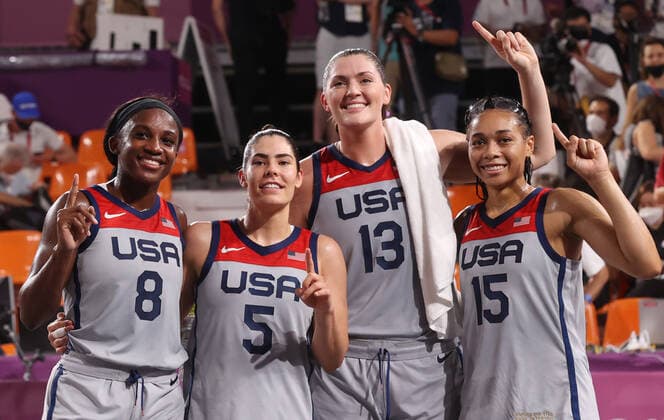 TOKYO, JAPAN - JULY 28, 2021: The USA s Jacquelyn Young, Kelsey Plum, Stefanie Dolson, and Allisha Gray (L-R) pose for a photo after winning their women s 3x3 basketball gold medal match against the ROC Team at the Tokyo 2020 Summer Olympic Games, Olympische Spiele, Olympia, OS at the Aomi Urban Sports Park. Stanislav Krasilnikov TASS  TS10A0DC