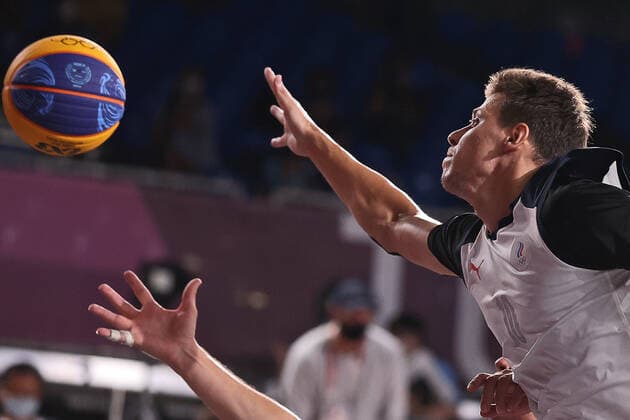 TOKYO, JAPAN - JULY 28, 2021: ROC s Kirill Pisklov reaches for the ball in their men s 3x3 basketball gold medal match against Latvia during the Tokyo 2020 Summer Olympic Games, Olympische Spiele, Olympia, OS at the Aomi Urban Sports Park. Stanislav Krasilnikov TASS  TS10A0EB