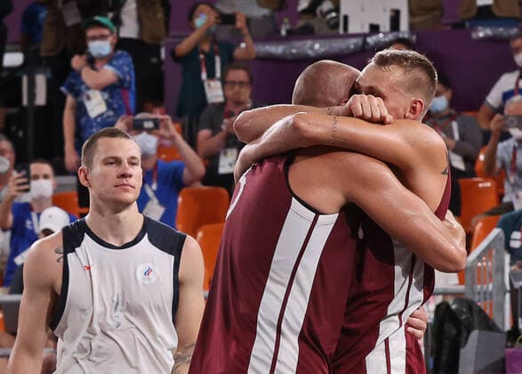 TOKYO, JAPAN - JULY 28, 2021: Latvia s players hug after winning their men s 3x3 basketball gold medal match against the ROC Team during the Tokyo 2020 Summer Olympic Games, Olympische Spiele, Olympia, OS at the Aomi Urban Sports Park. Stanislav Krasilnikov TASS  TS10A0F9