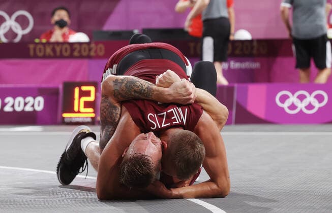 TOKYO, JAPAN - JULY 28, 2021: Latvia s players celebrate after winning their men s 3x3 basketball gold medal match against the ROC Team during the Tokyo 2020 Summer Olympic Games, Olympische Spiele, Olympia, OS at the Aomi Urban Sports Park. Stanislav Krasilnikov TASS  TS10A101