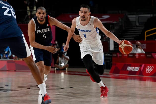 L-R Nicolas Batum of France and Tomas Satoransky of Czech in action during the basketball Group A match Czech Republic vs. France in Tokyo 2020 Summer Olympics, Japan, July 28, 2021. (CTKxPhoto OndrejxDeml) CTKPhotoP2021072812847 