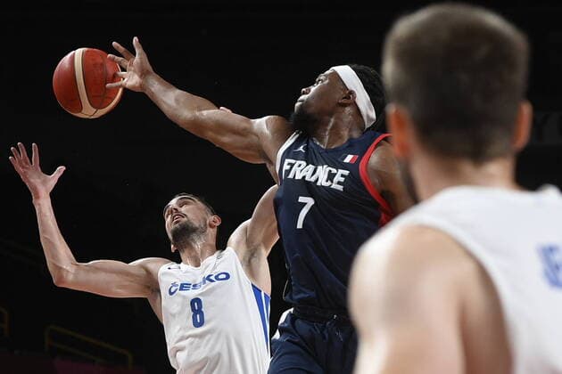 L-R Tomas Satoransky of Czech and Guerschon Yabusele of France in action during the basketball Group A match Czech Republic vs. France in Tokyo 2020 Summer Olympics, Japan, July 28, 2021. (CTKxPhoto OndrejxDeml) CTKPhotoP2021072811685 