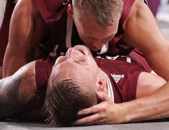 TOKYO, JAPAN - JULY 28, 2021: Latvia s players celebrate winning their men s 3x3 basketball gold medal match against the ROC Team during the Tokyo 2020 Summer Olympic Games, Olympische Spiele, Olympia, OS at the Aomi Urban Sports Park. Stanislav Krasilnikov TASS  TS10A17B