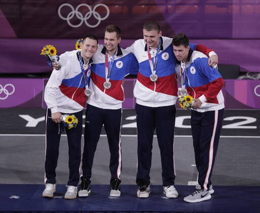 Silver medalists from ROC pose on the podium after losing to the USA in the Men s 3X3 Basketball at the Tokyo Summer Olympics in Tokyo, Japan, on Wednesday, July 28, 2021. This was the first year 3X3 basketball was an Olympic event.  OLY20210728643 BOBxSTRONG