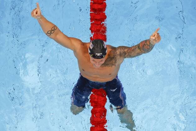 Tokio 2020 im Jahr 2021, Rückblick: Olympische Highlights Sport Bilder des Tages Tokyo Olympics: Swimming U.S. swimmer Caeleb Dressel celebrates after winning the men s 100-meter freestyle at the Tokyo Olympics on July 29, 2021, at Tokyo Aquatics Centre.  A14AA0000754988P
