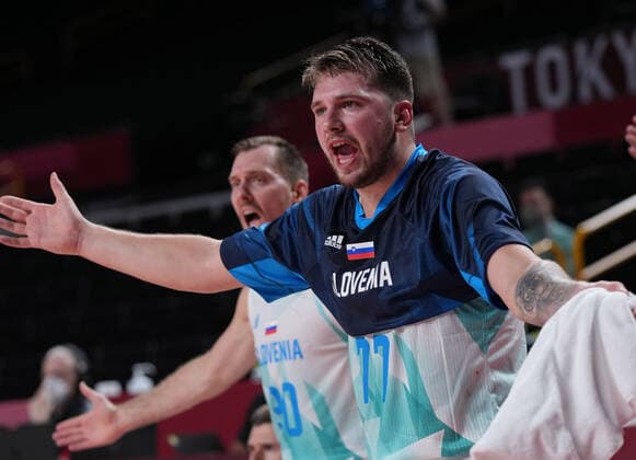 (210729) -- SAITAMA, July 29, 2021 -- Luka Doncic (R) of Slovenia reacts to referee during the men s preliminary round basketball match between Slovenia and Japan at Tokyo 2020 Olympic Games, Olympische Spiele, Olympia, OS in Saitama, Japan, July 29, 2021. ) (TOKYO2020)JAPAN-SAITAMA-OLY-BASKETBALL-MEN S PRELIMINARY MengxYongmin 