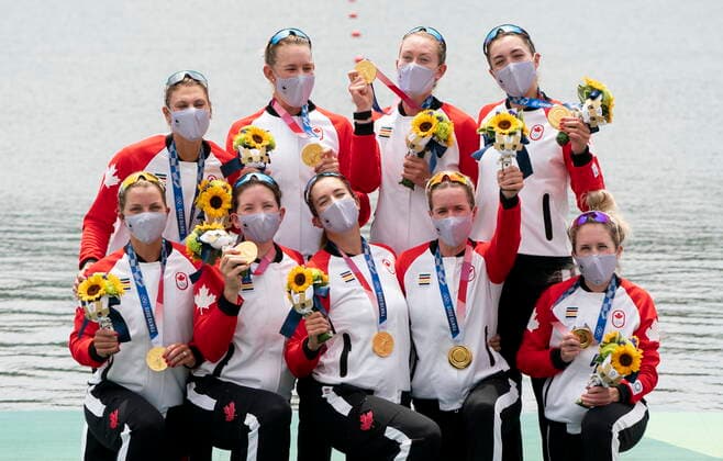 July 30, 2021, Tokyo, Japan: Canadaâ€⠢s Lisa Roman, Kasia Gruchalla-Wesierski, Christine Roper, Andrea Proske, Susanne Grainger, Madison Mailey, Sydney Payne, Avalon Wasteneys and Kristen Kit celebrate on the podium after winning the gold medal in womenâ€⠢s eight rowing competition at the Tokyo Olympics, Friday, July 30, 2021 in Tokyo, Japan. Lisa Roman Kasia Gruchalla-Wesierski Christine Roper Andrea Proske Susanne Grainger Madison Mailey Sydney Payne Avalon Wasteneys - ZUMAc35_ 20210730_zaf_c35_003 Copyright: xAdrianxWyldx