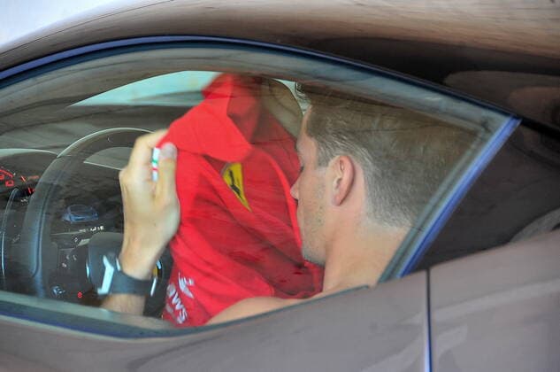 Formula 1 Grand Prix Hungarian Grand Prix 2021 30 07 2021, Hungaroring, Budapest, Formula 1 Grand Prix Hungarian Grand Prix 2021, pictured Charles Leclerc MCO 16 , Scuderia Ferrari Mission Winnow puts on his polo shirt in his Ferrari nordphotoxGmbHx xBratic nph00250
