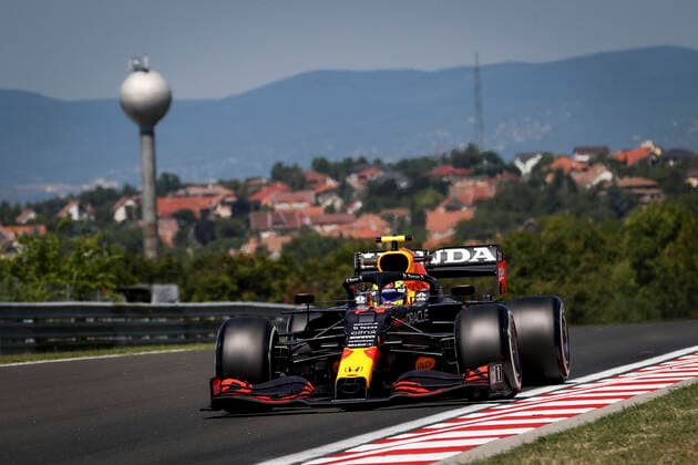 11 PEREZ Sergio (mex), Red Bull Racing Honda RB16B, action during the Formula 1 Magyar Nagydij 2021, Hungarian Grand Prix, 11th round of the 2021 FIA Formula One World Championship, WM, Weltmeisterschaft from July 30 to August 1, 2021 on the Hungaroring, in Mogyorod, near Budapest, Hungary FORMULE 1 : Grand Prix de Hongrie - 30 07 2021 DPPI Panoramic  00121022__V2_7123