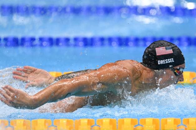 (210731) -- TOKYO, July 31, 2021 -- Caeleb Dressel of the United States competes during the men s 100m butterfly final at the Tokyo 2020 Olympic Games, Olympische Spiele, Olympia, OS in Tokyo, Japan, July 31, 2021. ) (TOKYO2020)JAPAN-TOKYO-OLY-SWIMMING-MEN-100M BUTTERFLY DuxYu 