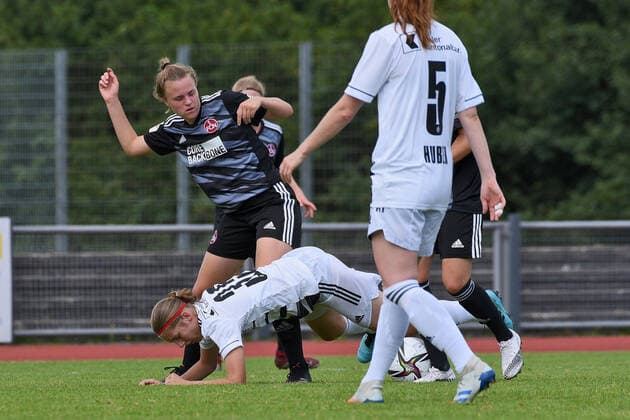 Flavia Luescher FC Basel 1893 35 vs Nadja Burkard 1 FC Nuernberg 22 and Amelie Thoele 1 FC Nuernberg 12 GER , 1 FC Nuernberg GER vs FC Basel 1893 SUI , Football , Women , Test Match , Season 2021 2022, 31 07 2021 DFL regulations prohibit any use of photographs as image sequences and or quasi video GER , 1 FC Nuernberg vs FC Basel 1893 , Women Football , Test Match , Season 2021 2022 , 31 07 2021 Boeblingen Copyright: xEibner-Pressefotox EP_TBR