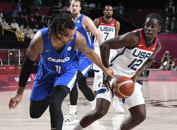 United States Jrue Holiday (12) drives to the basket guarded by Czechoslovakia s Blake Schilb during a Men s Basketball game at the Tokyo 2020 Olympics, Saturday, July 31, 2021, in Tokyo, Japan. USA won, 119-84.  OLY20210731824 MIKExTHEILER